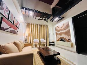 Χώρος καθιστικού στο Escape by Staypreneur Homes