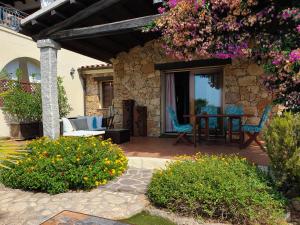 Zahrada ubytování Villetta in Residence La Bouganville