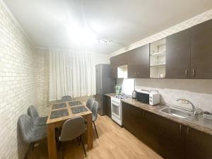 Η κουζίνα ή μικρή κουζίνα στο Central Best 2 bedrooms
