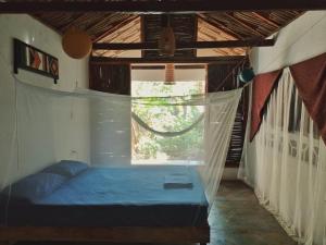 Una cama o camas en una habitación de Hostel Nugeku