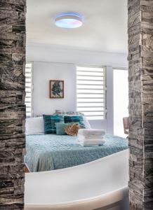 Postel nebo postele na pokoji v ubytování Casa Brisa del Mar - Steps to Montones Beach