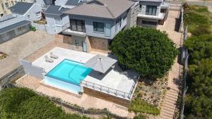 an aerial view of a house with a swimming pool at Casa Del Mi, Sedgefield in Sedgefield
