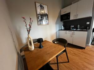Kuchyň nebo kuchyňský kout v ubytování Wohnquartier Mühlenhof in Neuenkirchen-Vörden