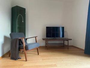 TV a/nebo společenská místnost v ubytování Alpenwald