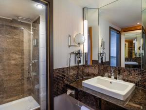 Ванная комната в Mövenpick Hotel Nürnberg Airport