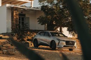 a silver lexusuana parked in front of a house at Kea Villa Thea by A&D Properties in Otzias