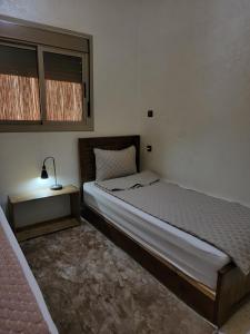 Una cama o camas en una habitación de Nova guest house
