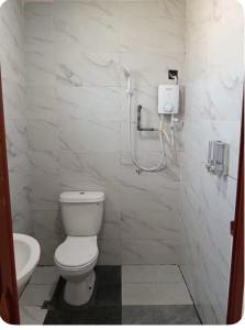 Ένα μπάνιο στο Rumah Kebun Bonda