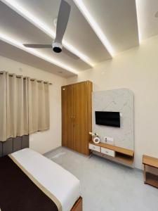 Ένα ή περισσότερα κρεβάτια σε δωμάτιο στο Prime pearl villa +17 φωτογραφίες