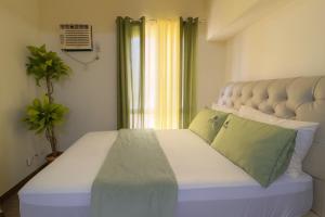 Ένα ή περισσότερα κρεβάτια σε δωμάτιο στο La Verti Residences 1524 +5 φωτογραφίες