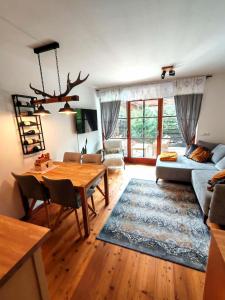 Posezení v ubytování FAMILY APARTMENT LAURA Bad Kleinkirchheim