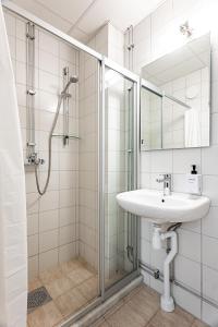Un baño de Injoy Compact Hotel Solna