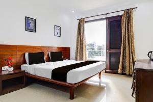 Postel nebo postele na pokoji v ubytování Tipsyy Inn Suites 020 + 33 fotografií