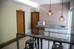 Kuchyň nebo kuchyňský kout v ubytování A fazenda Lindomar Gonçalves