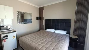 Kuchyň nebo kuchyňský kout v ubytování Cooee Motel + 17 fotografií