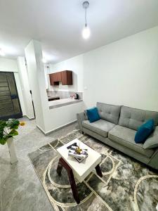 Posezení v ubytování Queens Stay Apartment