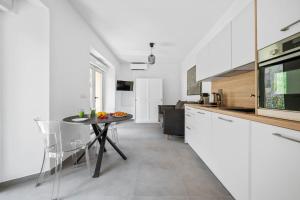 Køkken eller tekøkken på Le Val dOr - Calme - Grand Jardin - Parking privé + 27 billeder