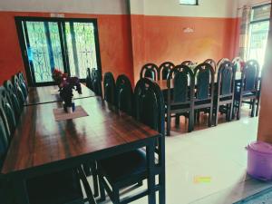 a conference room with a long table and chairs at Hotel Kailash lumbini in Rummindei