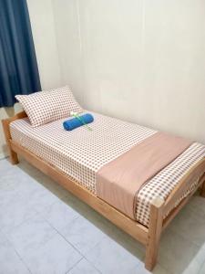 Ένα ή περισσότερα κρεβάτια σε δωμάτιο στο Private & Cosy unit A - 2BR Apt Fast Wi-Fi, Netfli