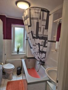 Ένα μπάνιο στο Ferienwohnung Resi