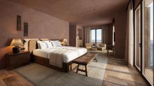 Postel nebo postele na pokoji v ubytování Zannier Île de Bendor