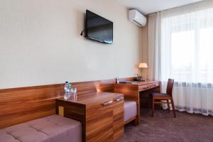 TV a/nebo společenská místnost v ubytování Zagrava Hotel