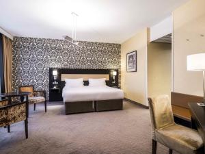 Postel nebo postele na pokoji v ubytování Mercure Antwerp City South