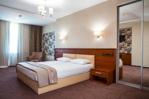 Postel nebo postele na pokoji v ubytování Zagrava Hotel