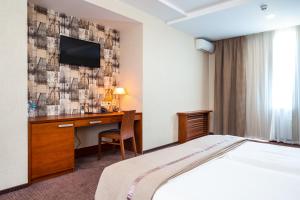 Postel nebo postele na pokoji v ubytování Zagrava Hotel