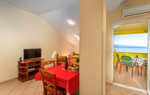 Μια τηλεόραση ή/και κέντρο ψυχαγωγίας στο Apartman Mario by Villas Guide
