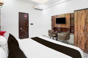 Μια τηλεόραση ή/και κέντρο ψυχαγωγίας στο Collection O Shandilya Grand Residency