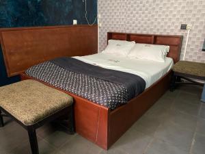 Ένα ή περισσότερα κρεβάτια σε δωμάτιο στο MAISON SOLAIRE GuestHouse