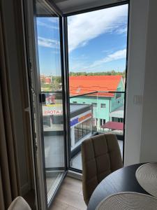 En balkon eller terrasse på Cozy Apartment Radauti