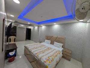 Postel nebo postele na pokoji v ubytování Happy In- Laxmi Nagar + 17 fotografií