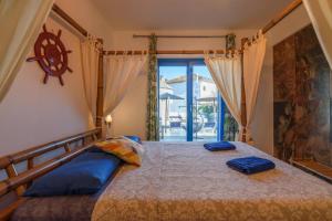 Photo de la galerie de l'établissement Katigiorgis Blue Hotel & Bungalow SPA Resort, à Agios Georgios