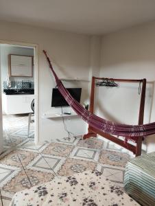 TV a/nebo společenská místnost v ubytování Residencial Humberto Mendes + 6 fotografií