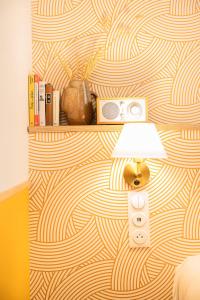 a room with a lamp and a wall at Grand Juste in Marseille +98 photos