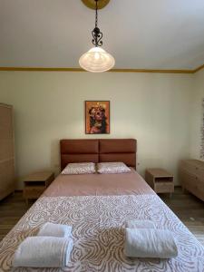 Ένα ή περισσότερα κρεβάτια σε δωμάτιο στο Fictus Stay