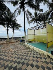 Bazén v ubytování Island View Homestay - Malpe Beach nebo v jeho okolí