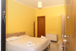 Postel nebo postele na pokoji v ubytování Il Ristoro di Cerellio