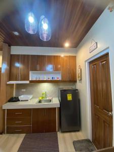 Kuchyň nebo kuchyňský kout v ubytování 8 Spatial - ForeverMC Condotel 2BR 5114