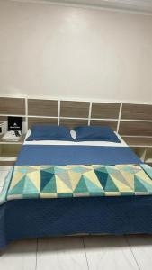 Ένα ή περισσότερα κρεβάτια σε δωμάτιο στο Hotel Ellos