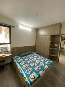 Postel nebo postele na pokoji v ubytování Nguyên Anh Signature