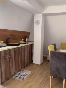 a kitchen with a sink and a counter top at Apartment Aluna 3 in Višegrad