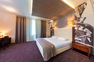 Postel nebo postele na pokoji v ubytování Zagrava Hotel