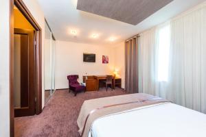 Postel nebo postele na pokoji v ubytování Zagrava Hotel