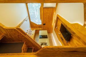 Μια τηλεόραση ή/και κέντρο ψυχαγωγίας στο Green Garden Foz - Casas e Lofts em um Bosque