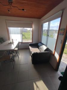 En eller flere senge i et værelse på Apart El Cardenal Chapadmalal MDQ + 13 billeder