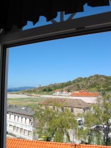 a view from a window of a building at Apartamentos Playa Monte Pindo - Lobeira do Mar in O Pindo