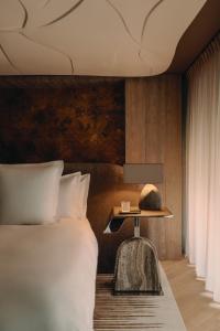 En eller flere senge i et værelse på Rosewood Courchevel Le Jardin Alpin